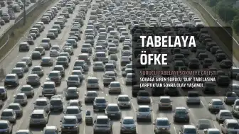 Sürücü, çarptığı 'DUR' tabelasını yerinden sökmeye çalıştı
