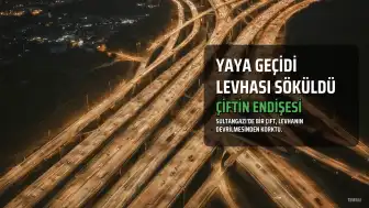 Sultangazi'de Bir Çift, Rüzgar Nedeniyle Yaya Geçidi Levhasını Aracının Üzerine Devrileceği Endişesiyle Söktü